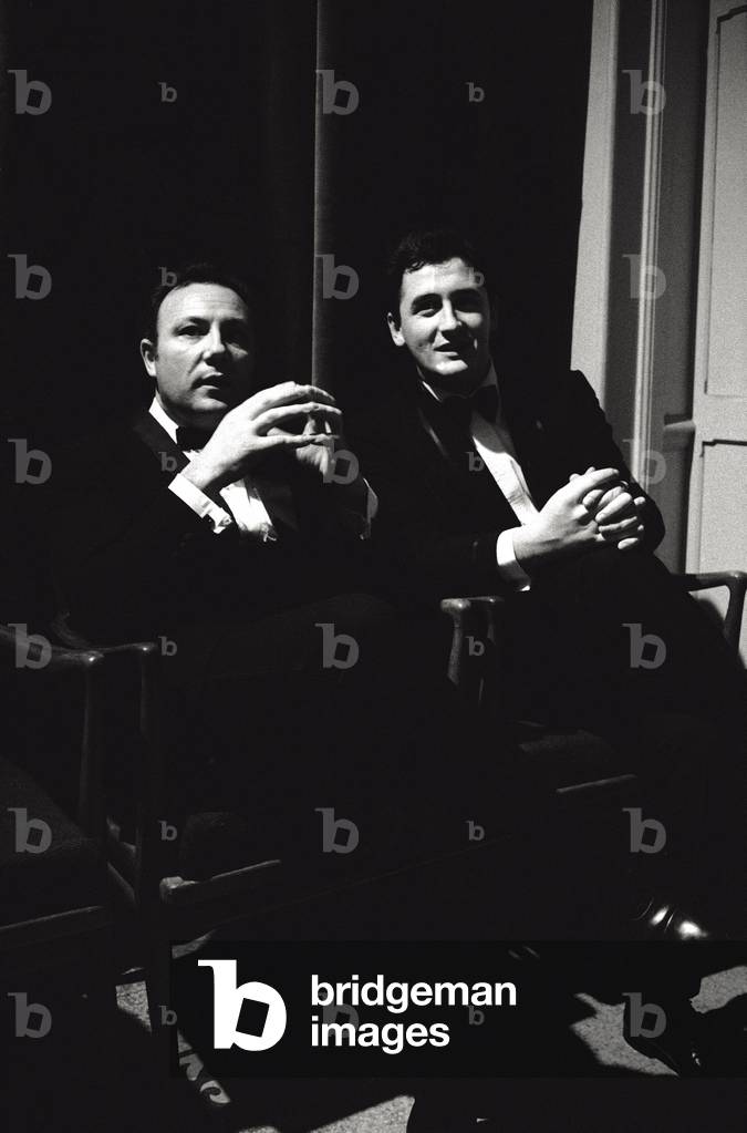 Claudio Villa and Pino Donaggio are chatting while they sat down