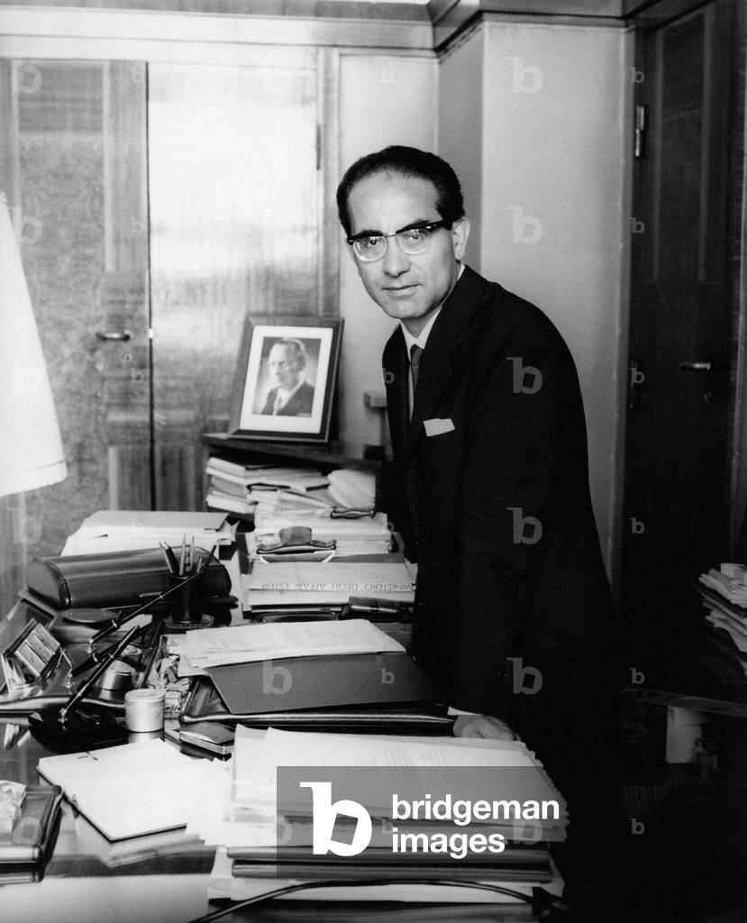 Emilio Colombo standing in his office