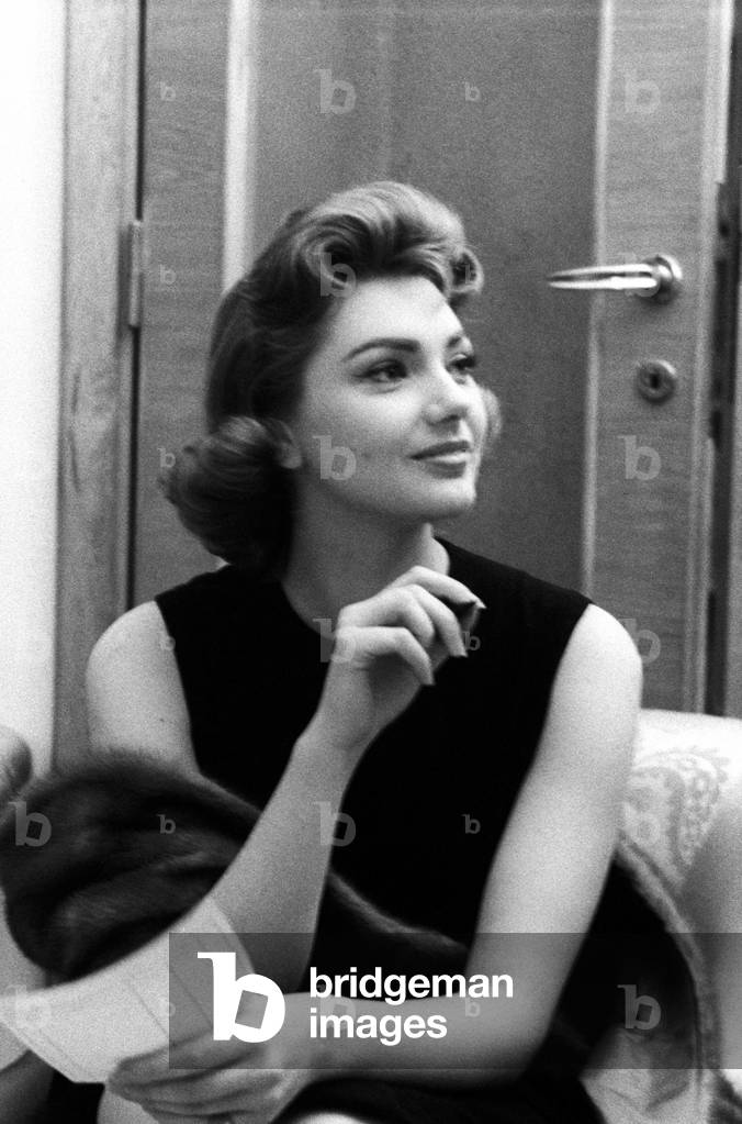 Sylva Koscina seated with a mink tippett