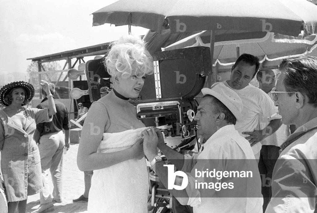 Federico Fellini and Sandra Milo on the set of Juliet of the Spirits, Italy, 1965 (b/w photo)