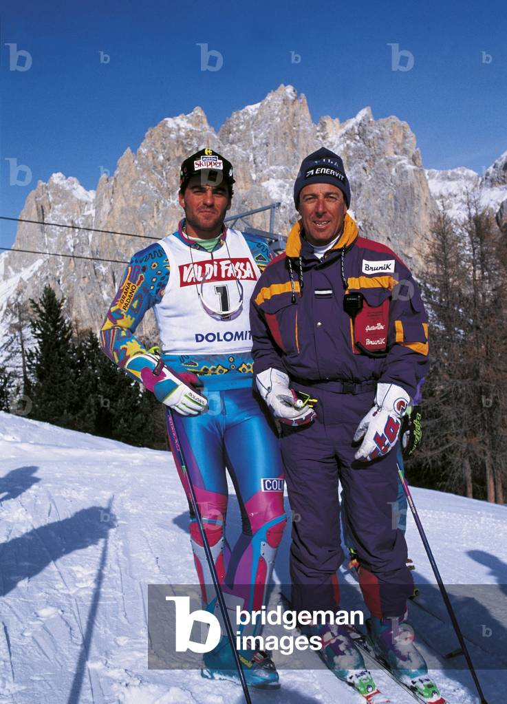 Alberto Tomba and Gustavo Thoeni with skiwear on