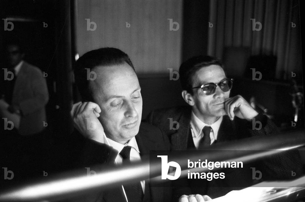 Pier Paolo Pasolini and Giorgio Bassani in the dubbing room, Italy, 1962 (b/w photo)