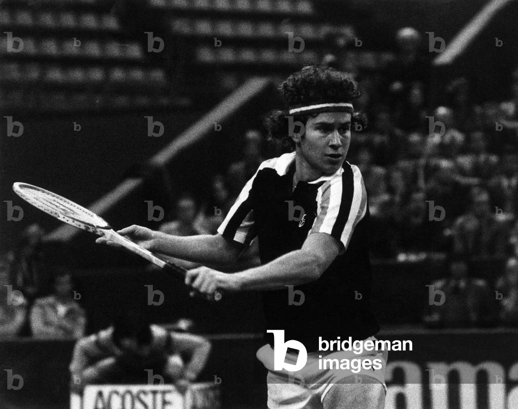 John McEnroe getting ready to play a backhand