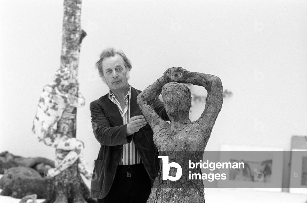Olavi Lanu with one of his vegetal sculptures