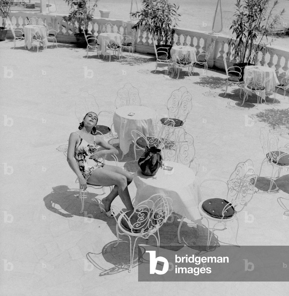 Anna Maria Mondani relaxing in the sun, Italy, 1953 (b/w photo)