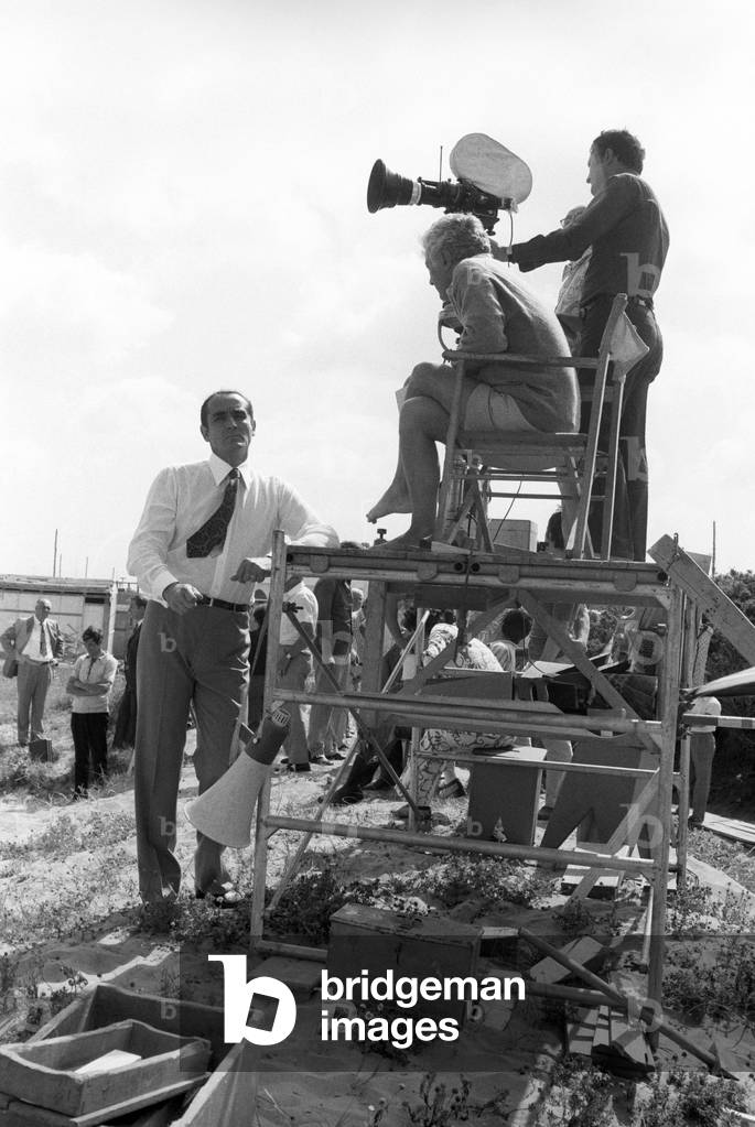 Dino Risi and Vittorio Gassman on the film set of In the Name of the Italian People, Italy, 1971 (b/w photo)