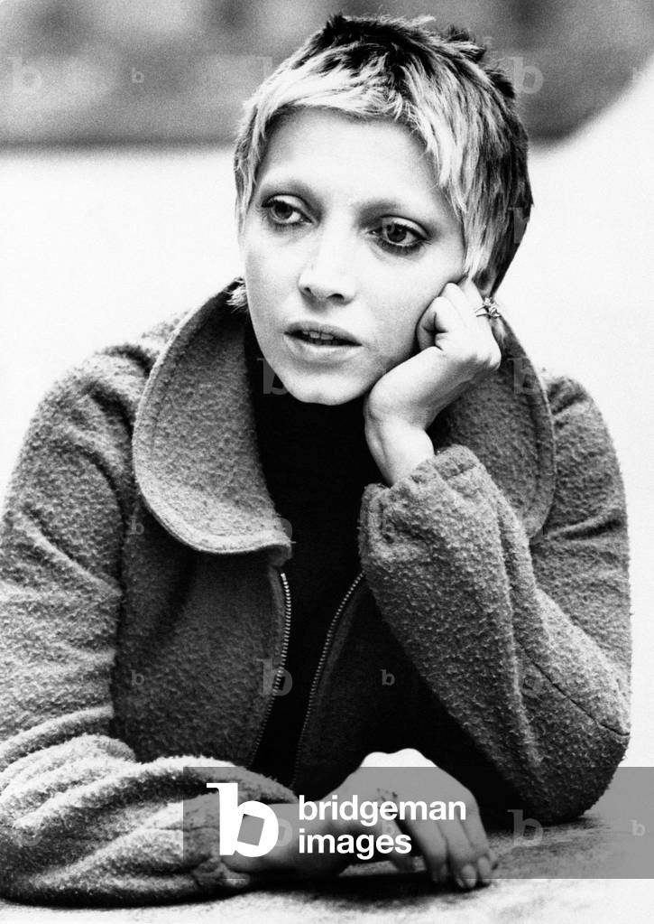 Mariangela Melato keeping her hand on her cheek