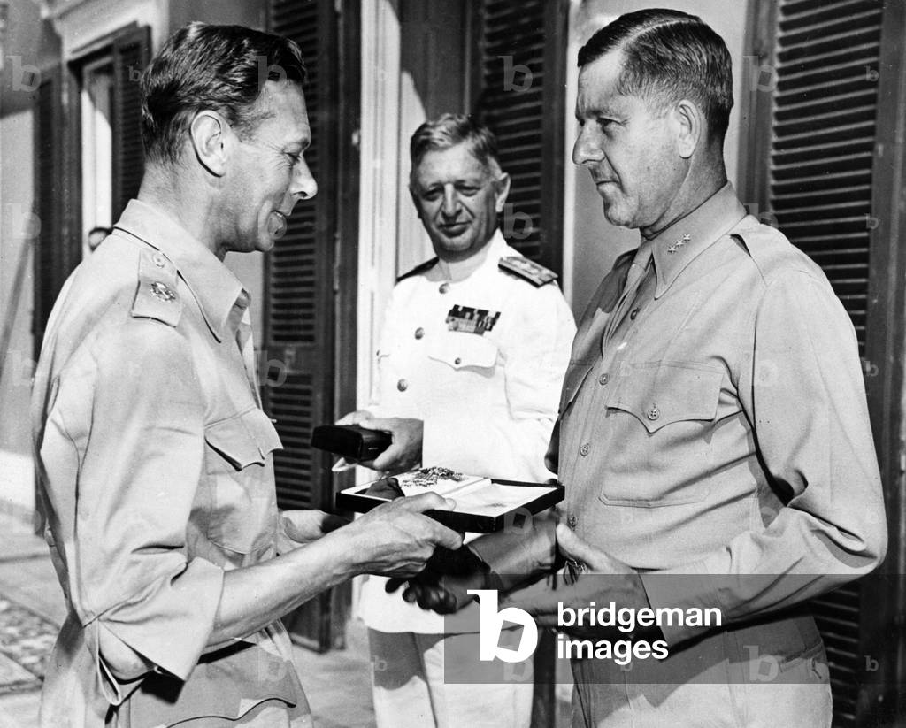 King George VI awarding a decoration to Jacob Devers