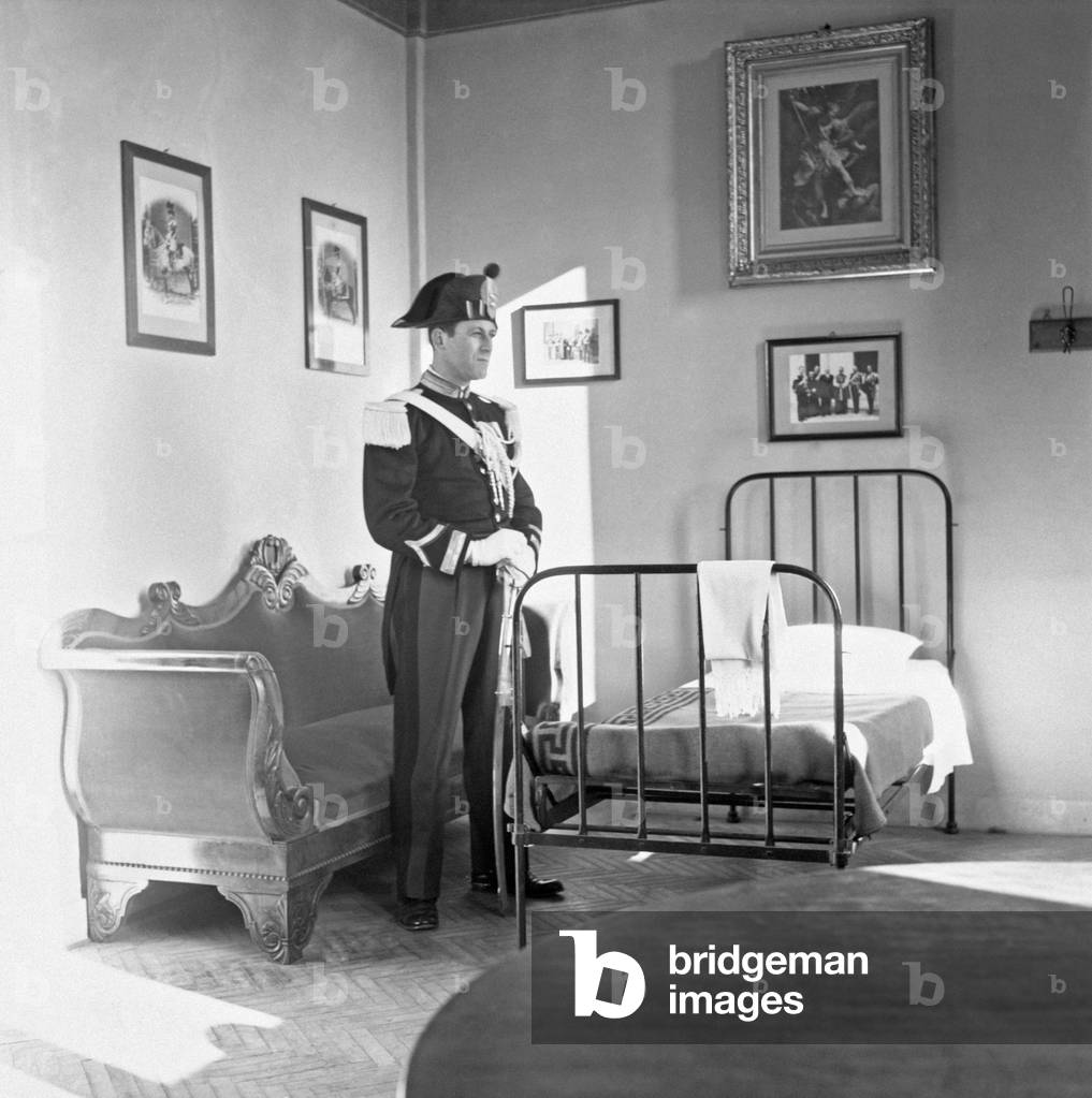 A carabiniere guarding a bedroom prepared for the papal conclave, Vatican City, Vatican City State