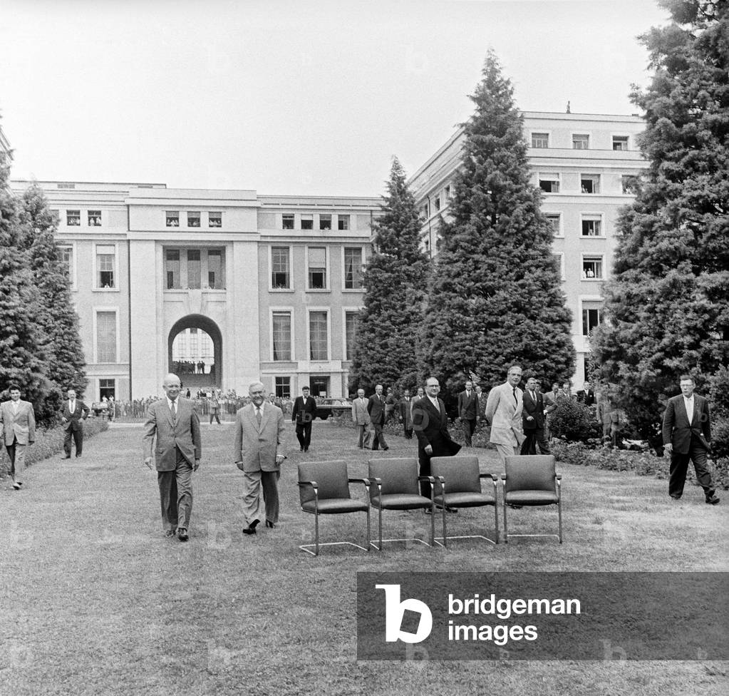 Nikolai Bulganin, Dwight Eisenhower, Edgar Faure and Anthony Eden walking on the lawn of the Palace of Nations in Geneva, Geneva, Switzerland