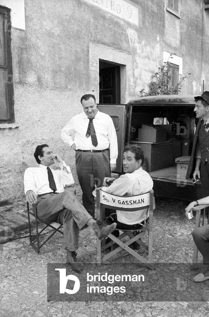 Mario Cecchi Gori, Ugo Tognazzi and Vittorio Gassman on the film set of March on Rome, Italy, 1962 (b/w photo)