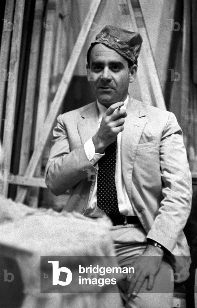 Vittorio Caprioli smoking a cigarette, Montecarlo, Italy, 1950