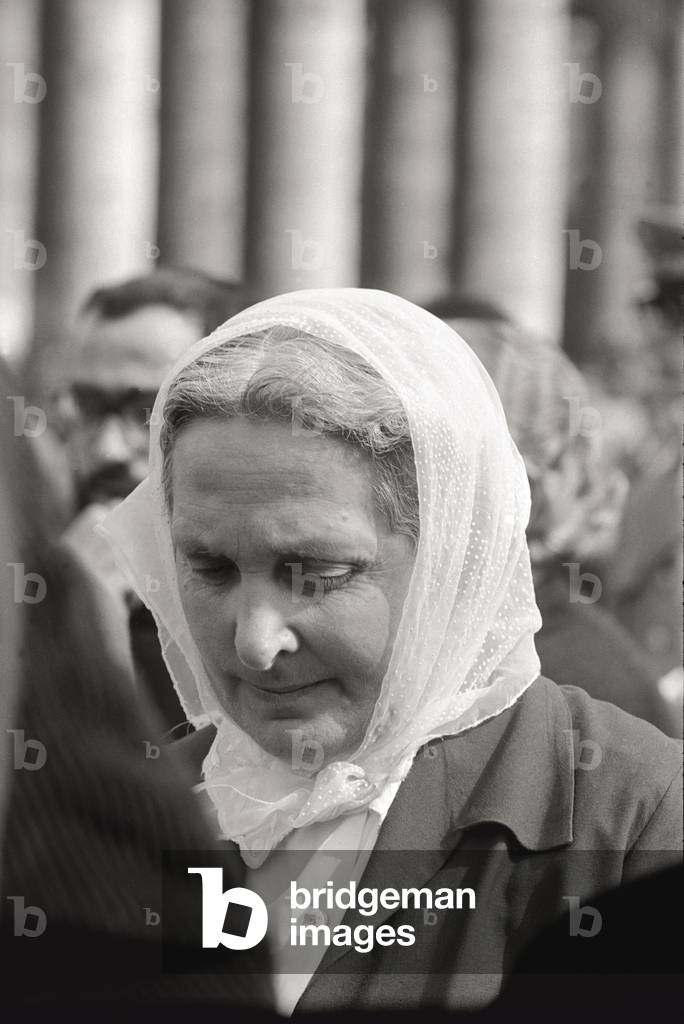 A believer in St. Peter's Square