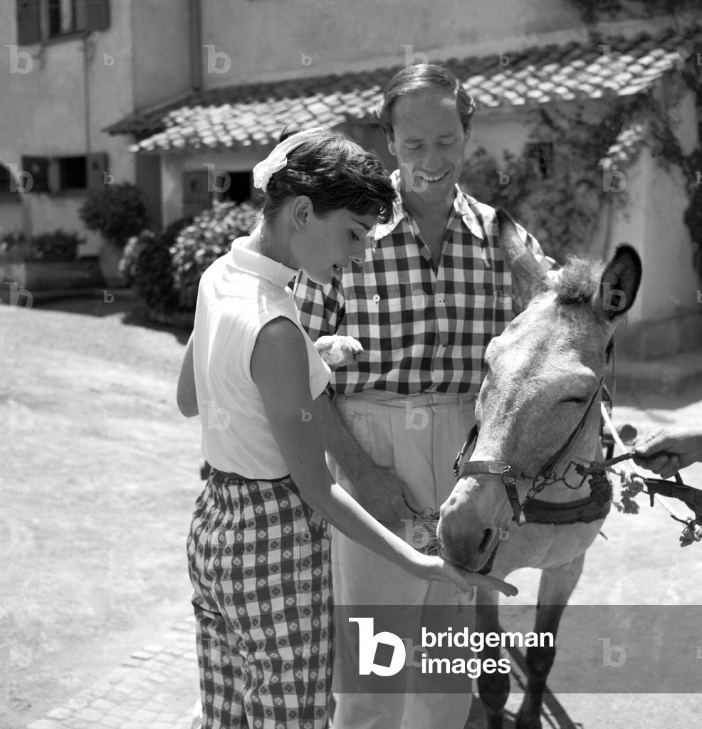 Audrey Hepburn in the countryside, Italy, 1955 (b/w photo)