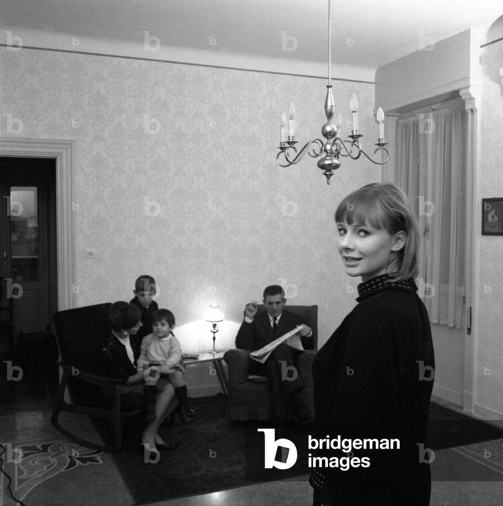 A foreigner baby sitter with the Italian family employing her, Italy