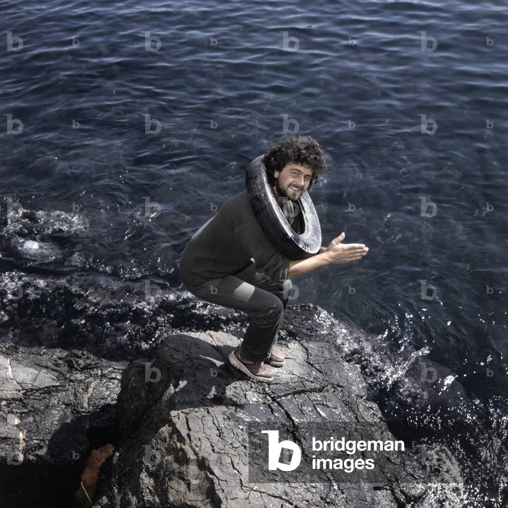 Beppe Grillo pretending to plunge