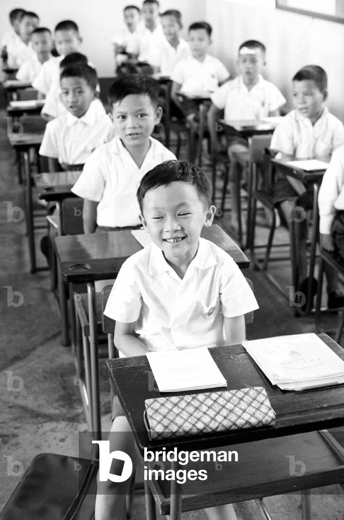 Schoolchildren sitting at their desks, Hong Kong, 1950