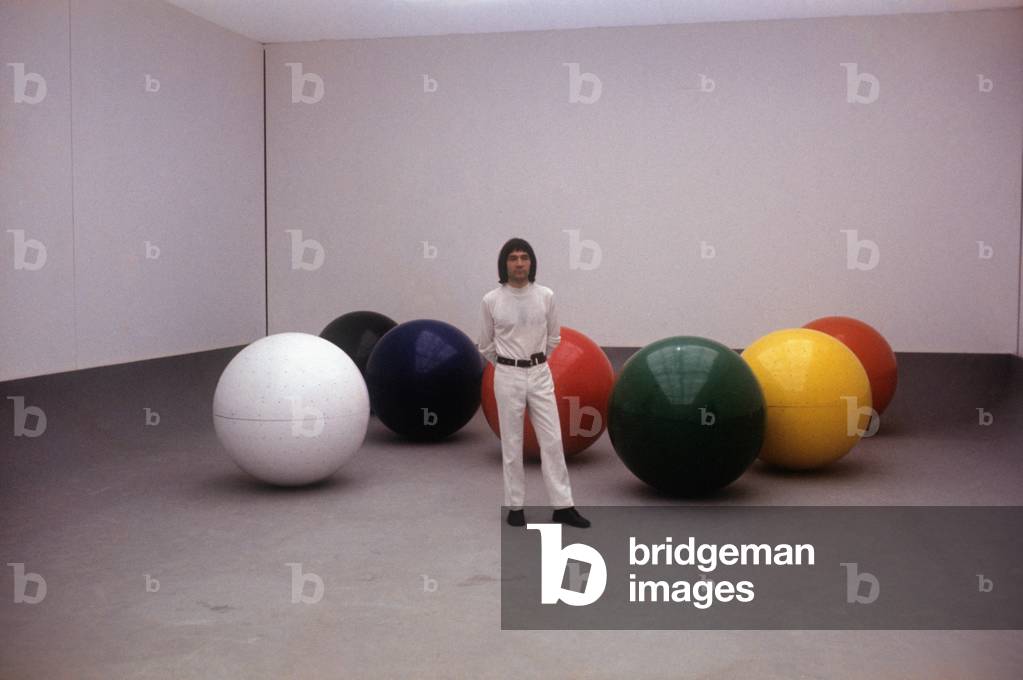 Sergio Lombardo in front of Sfere con sirene at the 35th Venice Biennale
