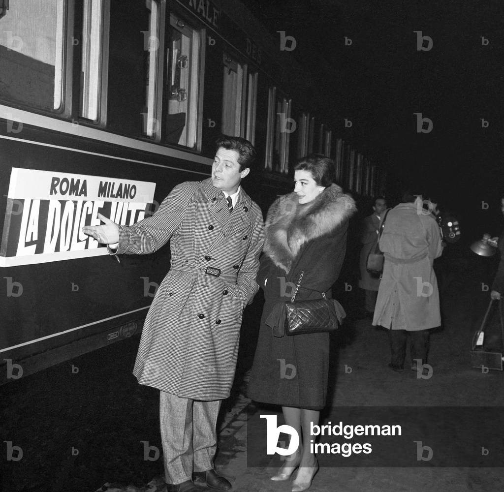 Marcello Mastroianni and Anouk Aimée at Termini railway station, Italy, 1960 (b/w photo)