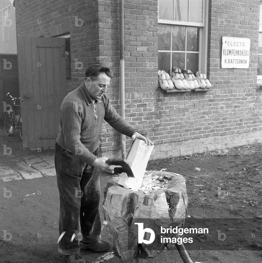 An artisan doing a pair of dutch clogs, Netherlands