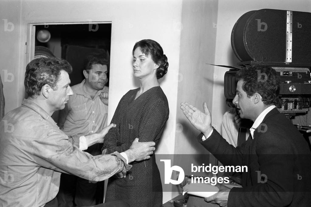 Alida Valli, Gillo Pontecorvo and Yves Montand on the set of The Wide Blue Road, Italy, 1957 (b/w photo)