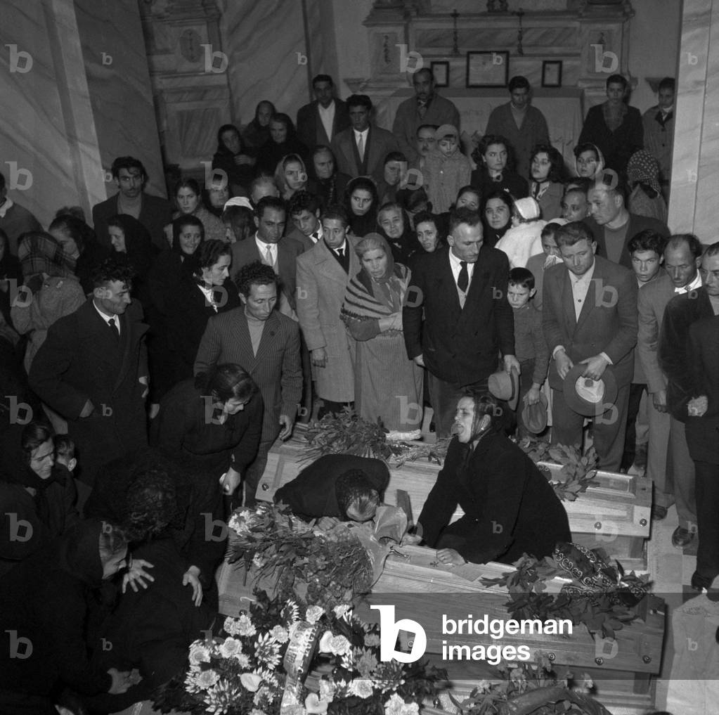 Women crying at the funeral of the victims of Marcinelle, Manoppello, Italy