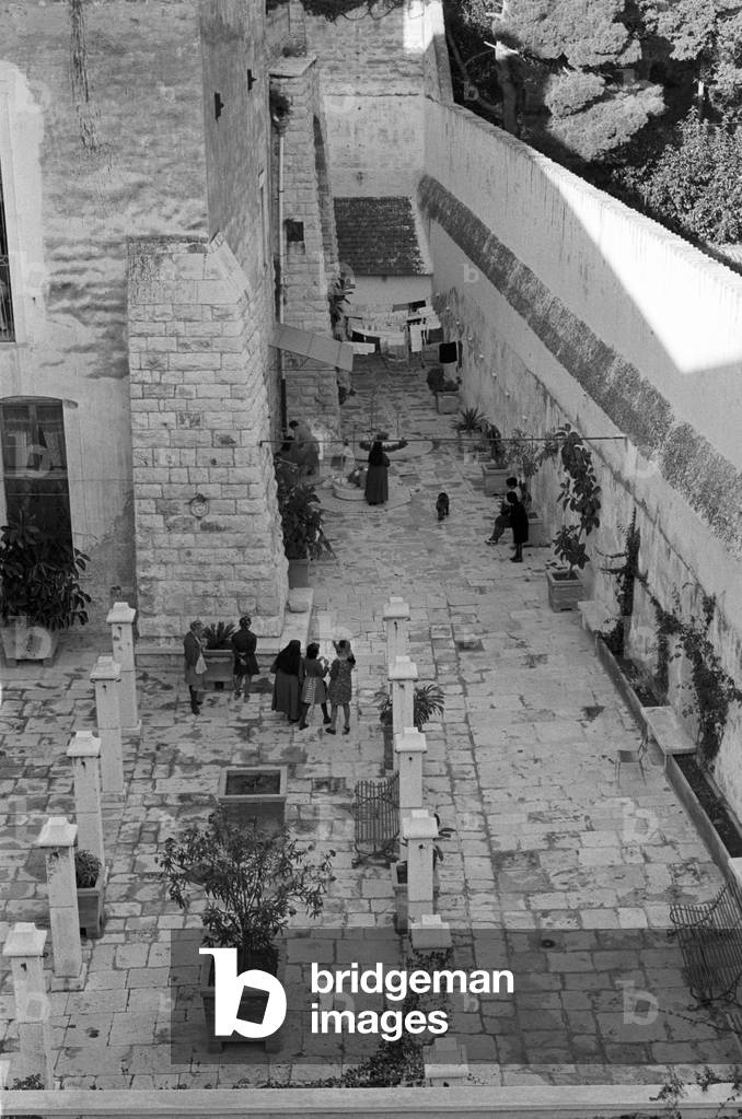 Prisoners in the courtyard of Trani women's prison