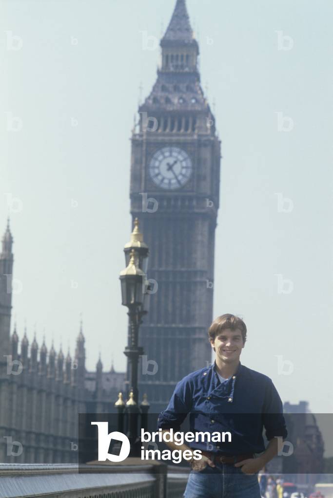 Miguel Bosé smiling in front of the Big Ben, London, Great Britain