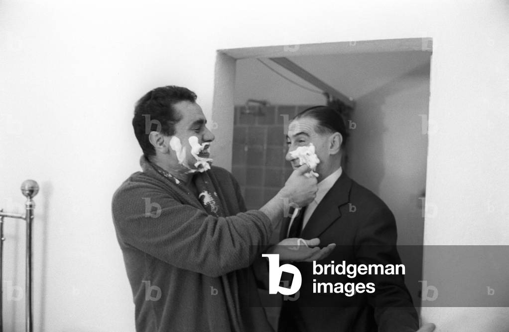 Enzo Tortora jokes with a colleague by covering him with shaving cream