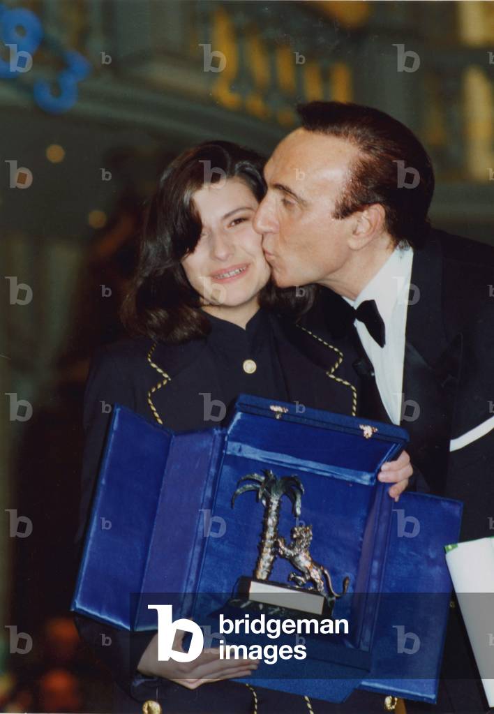 Pippo Baudo kissing Laura Pausini