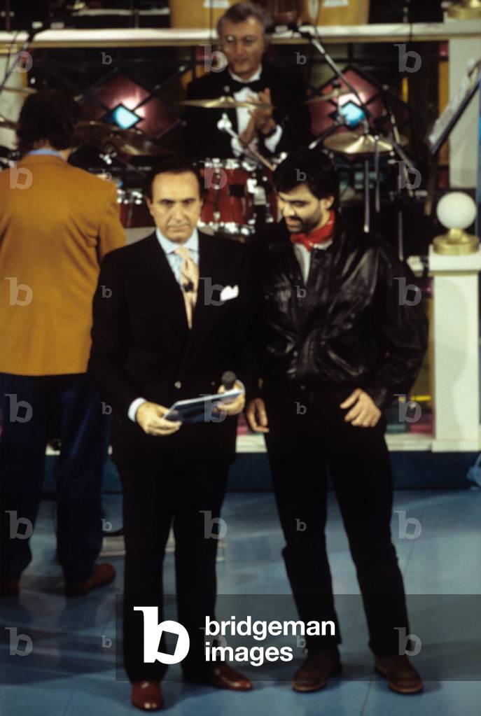 Andrea Bocelli next to Pippo Baudo on the stage of Ariston Theatre, Sanremo, Italy