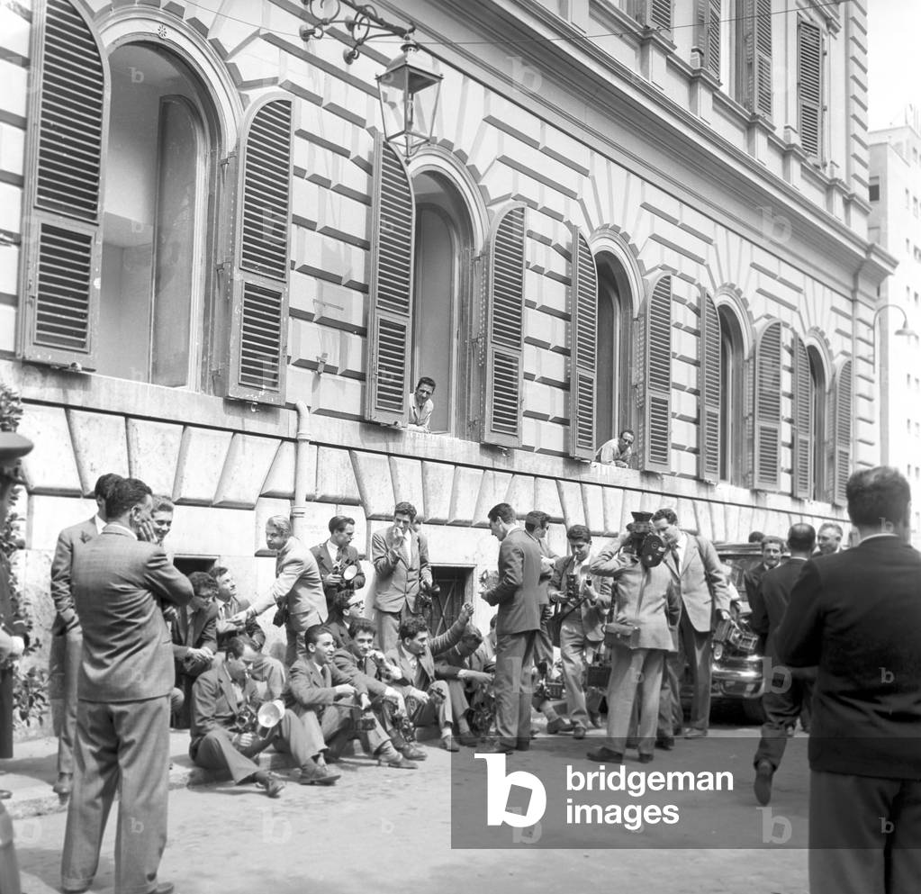 Crowd of photographers waiting for the Royal Family of Monaco, Rome, Italy, 1959 (b/w photo)