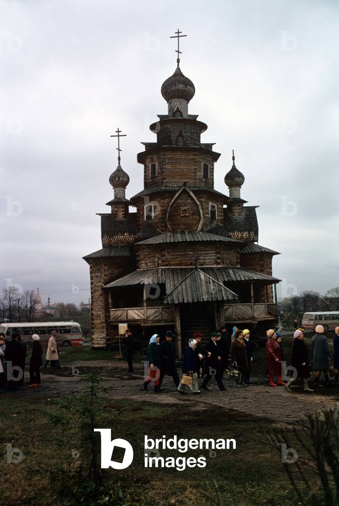 Tourists visiting one of the wooden church in Suzdal, Suzdal, Russian Federation
