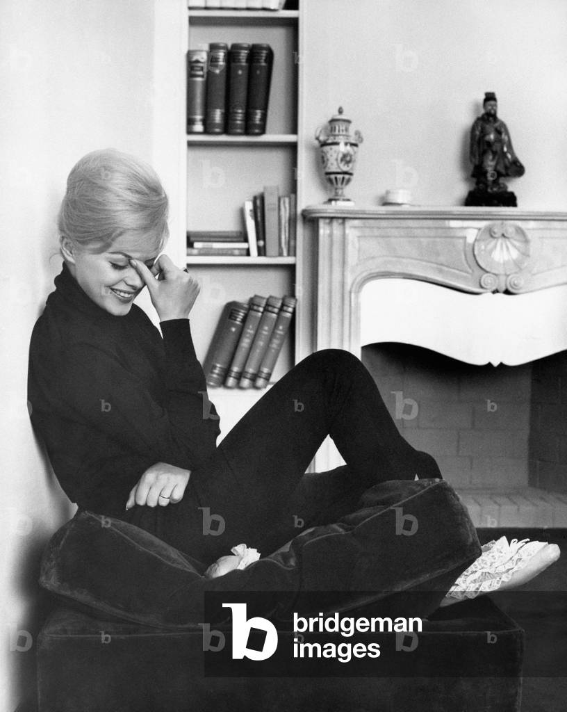 Virna Lisi on a pouf,, 1961