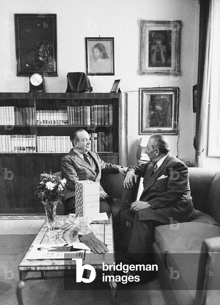 Italian publisher Arnoldo Mondadori chatting with Italian writer Aldo Palazzeschi (Aldo Pietro Vincenzo Giurlani), Rome, March 1957 (photo)