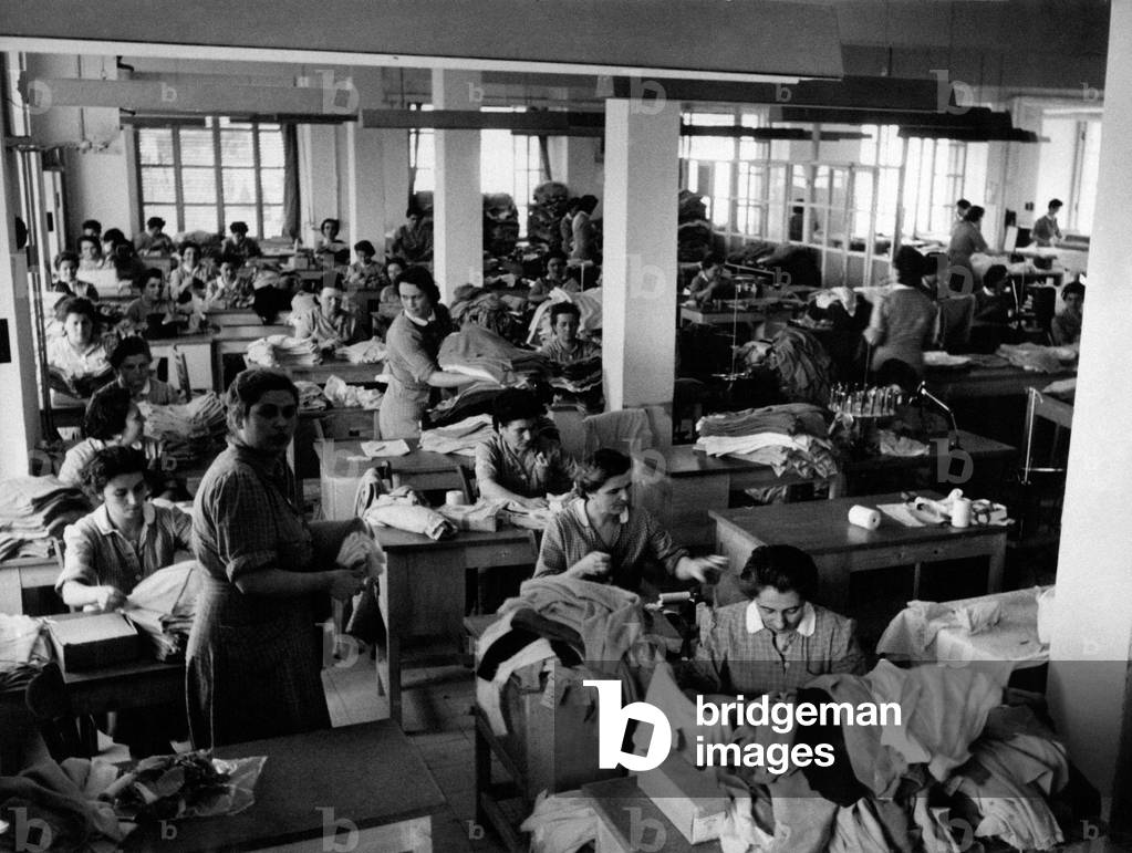 Some seamstresses working in the knitwear factory of Luisa Spagnoli, Italy