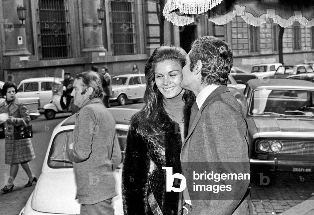 Omar Sharif and Florinda Bolkan on a street, Rome, Italy, 1971 (b/w photo)