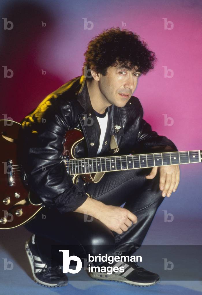 Edoardo Bennato posing with his guitar, Italy