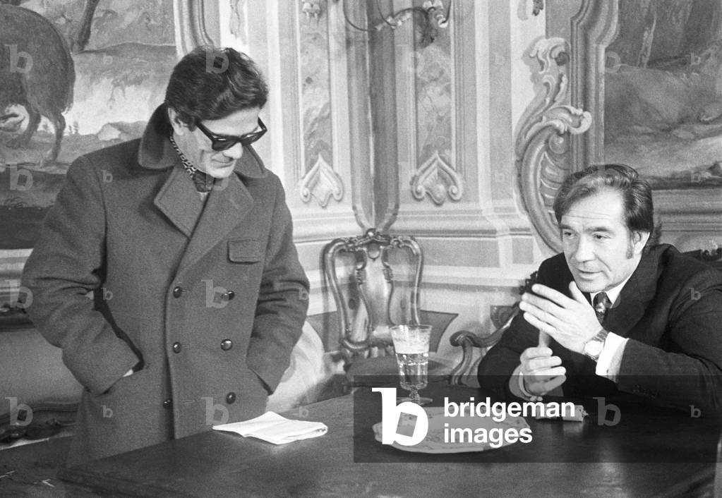 Pier Paolo Pasolini and Ugo Tognazzi on the set of the film Porcile, Italy, 1969 (b/w photo)