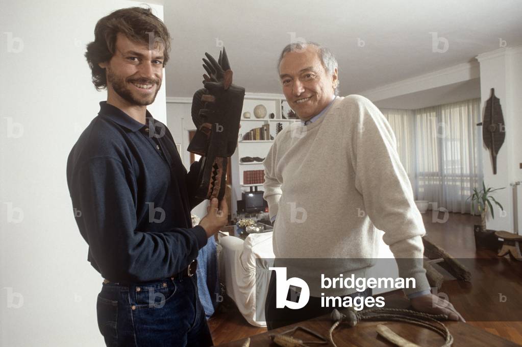 Alberto Angela showing a mask beside Piero Angela