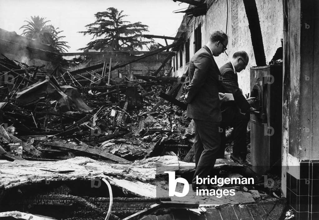 The remains of a store set on fire during race riots
