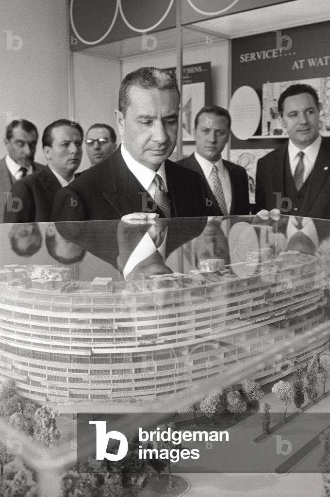 Aldo Moro looking a scale model