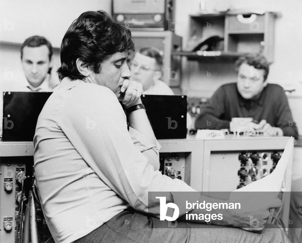 Sacha Distel reading sitting, Paris, France