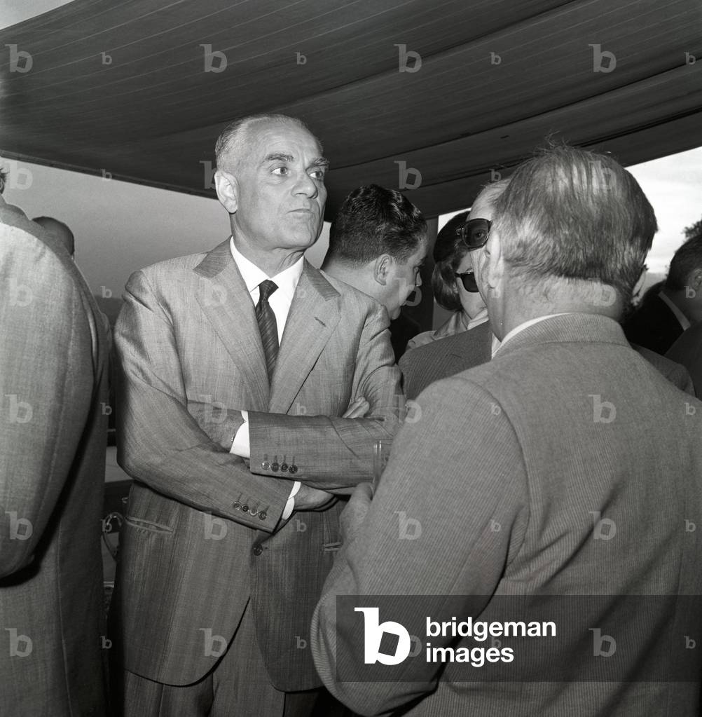 Alberto Moravia arms crossed, Italy, 1963 (b/w photo)