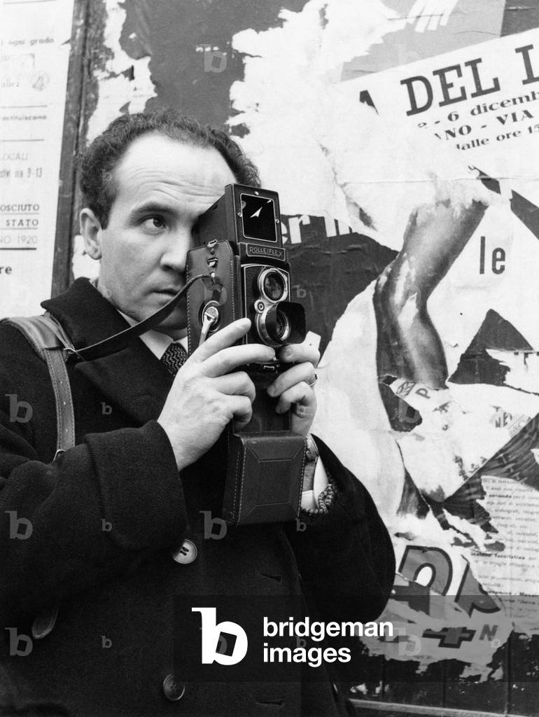 Mario De Biasi taking a picture