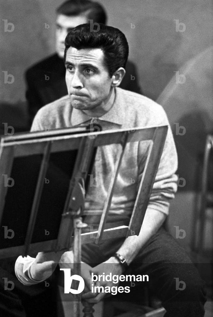 Gilbert Becaud during the rehearsal of L'Opera d'Aran, France, 1962 (b/w photo)