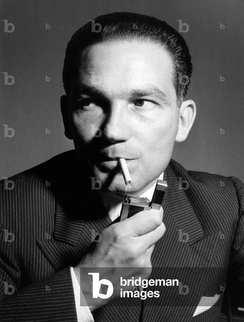 Mario Ferrari Aggradi smoking a cigarette