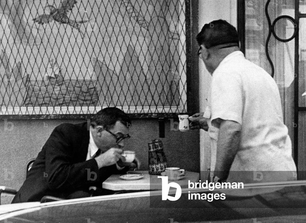 James Thomas Farrell having a cup of coffee