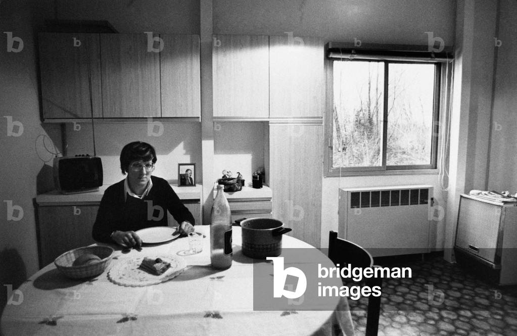 Portrait of a woman in her kitchen