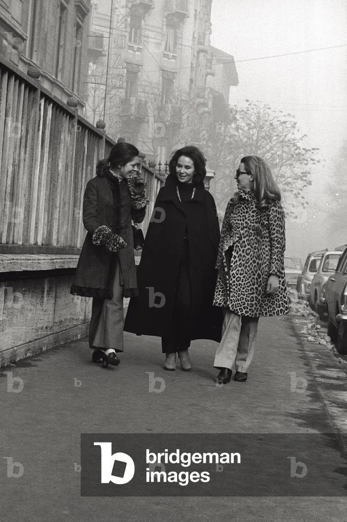 Three young women are walking